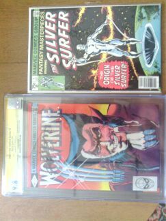 WOLVERINE 1 CGC 98 SIGNED BY STAN LEE AND CHRIS CLAREMONT  SILVER SURFER 1 