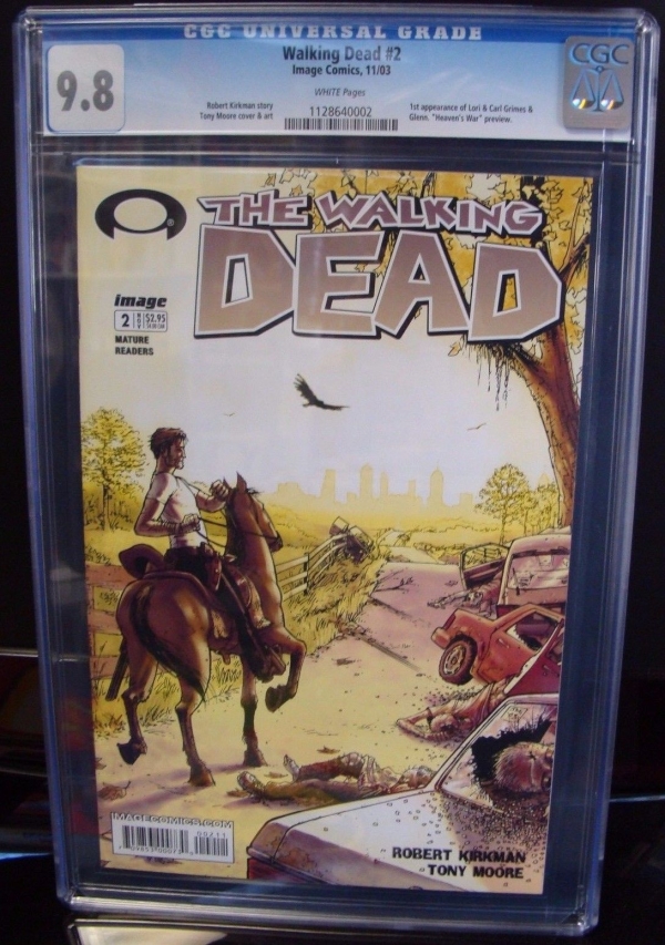 The Walking Dead 2 1st Print Black Label CGC 98 RARE Comic 1st Carl  Lori 