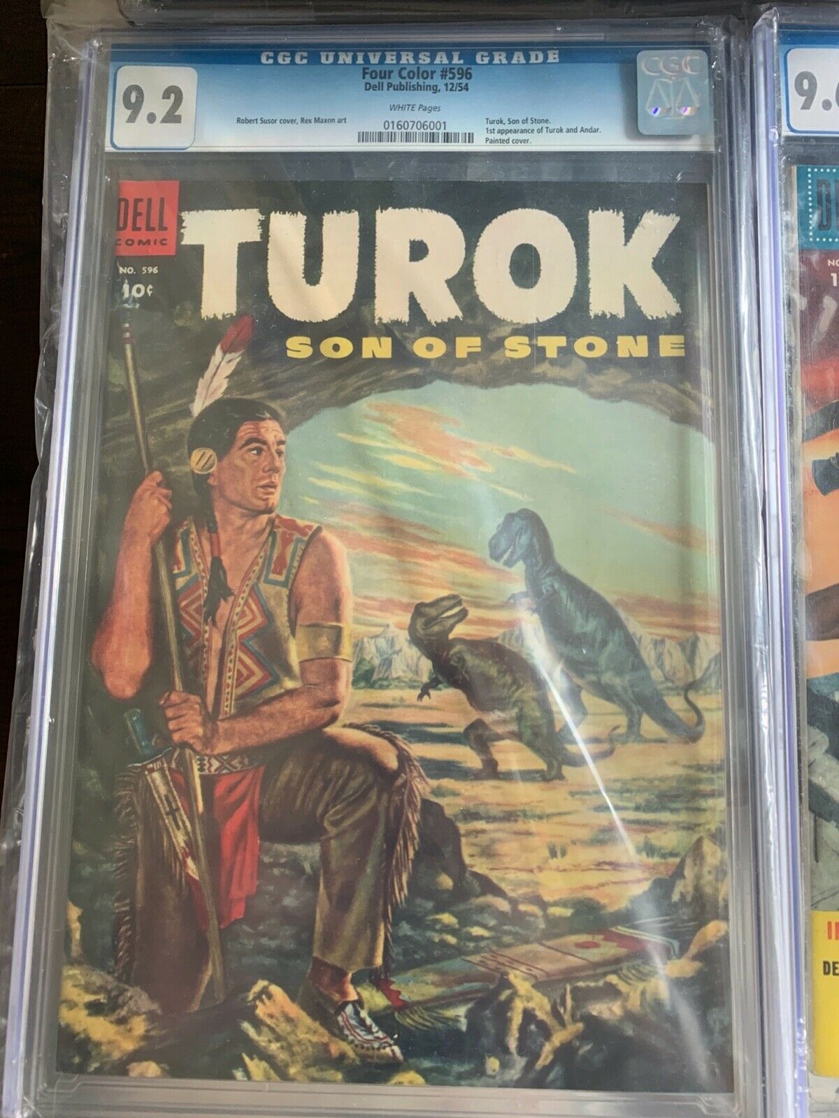 Four Color 596 CGC 92 NM 1st Turok Son of Stone Dell OFF WHITE 121954